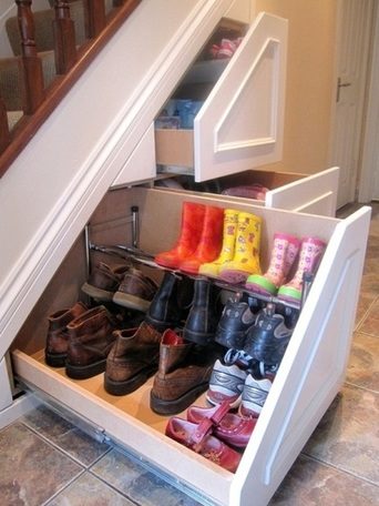shoes under stairs